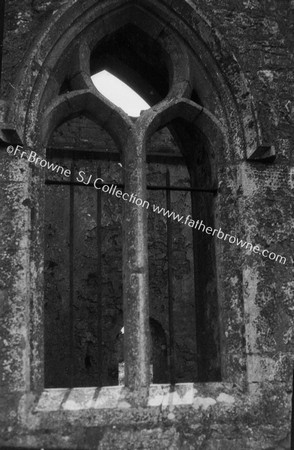 CLARE ABBEY(AUGUSTINIAN) WINDOW IN N.WALL OF NAVE WITH MONKSHEAD IN LEFT RETURN OF MOULDING